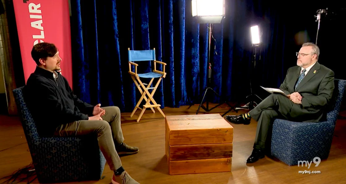 Burt Brooks, PathAble AI CEO, and Mark Bonamo of my9 news engage in an interview segment in a TV studio
